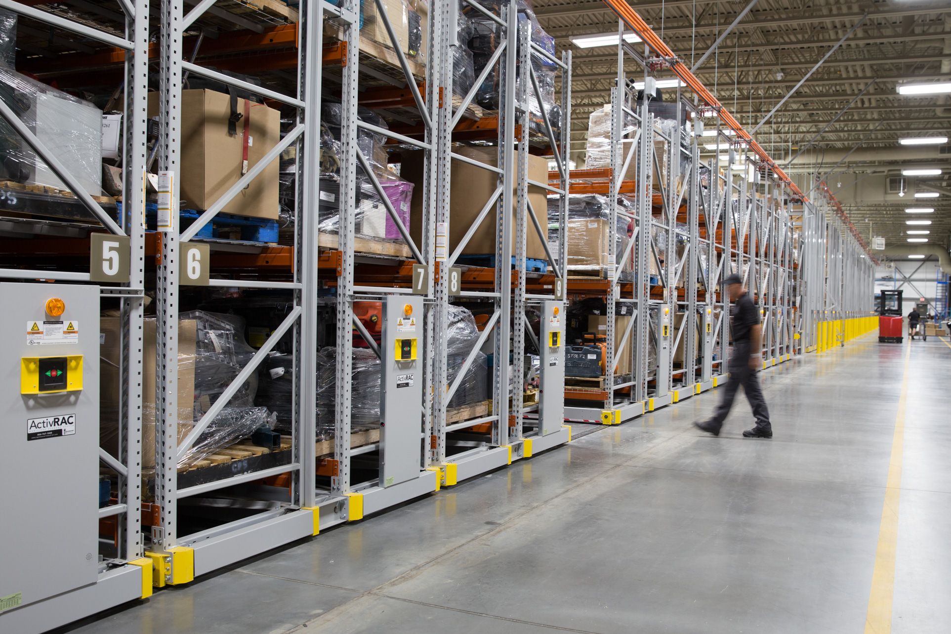 A Man Checking Items At A Storage Facility